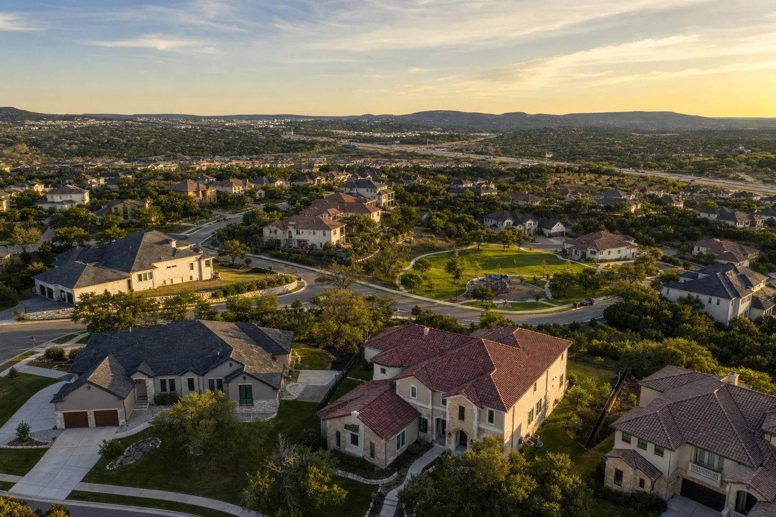 Alamo Ranch, San Antonio — master-planned homes along the Highway 151 corridor at golden hour